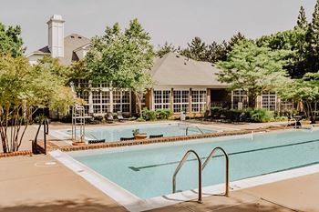 Swimming pool with expansive sundeck